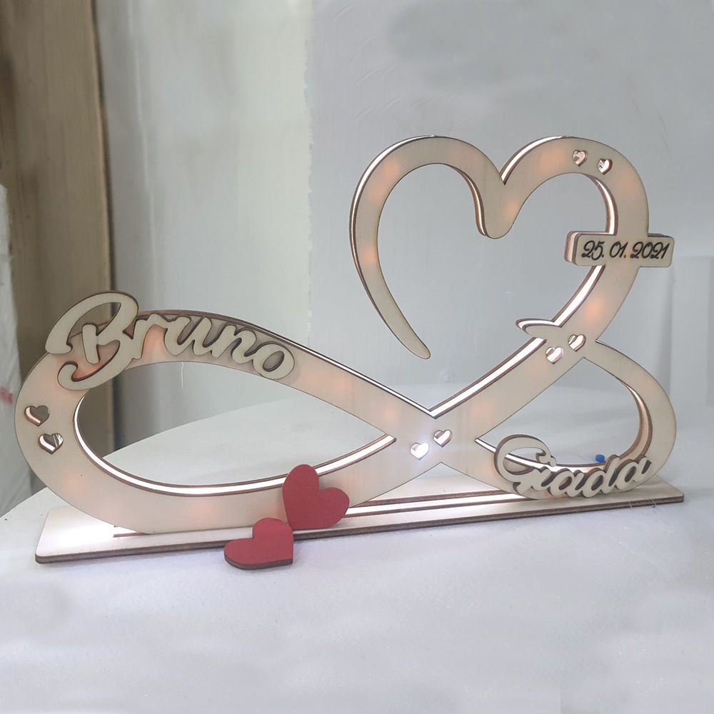 Lampada in legno Infinito con luce LED